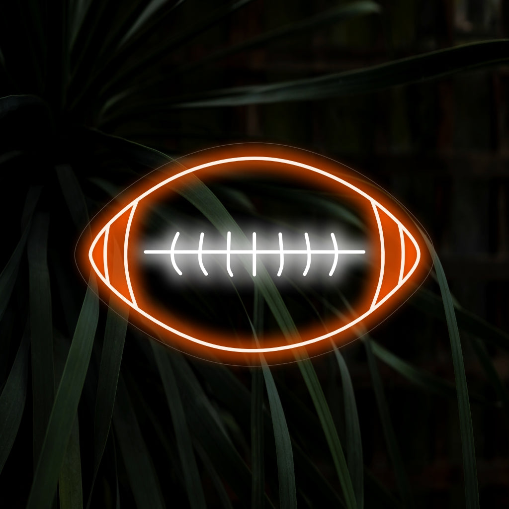"American Football Ball Neon Sign" - Ett dynamiskt neonljus med den ikoniska amerikansk fotbollsbollen som lägger till en sportig och energisk atmosfär till ditt spelrum eller inredning med sporttema.