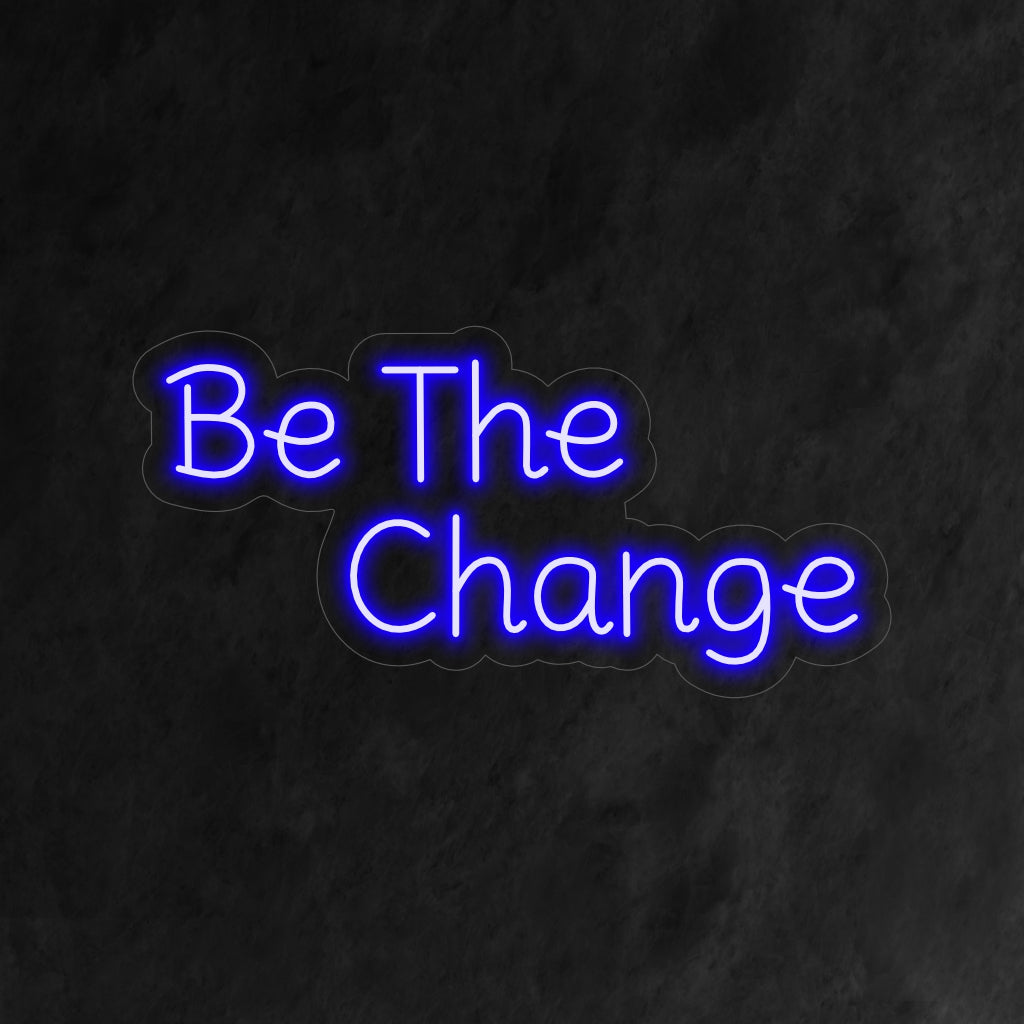"Be the Change Neon Sign" - Ett kraftfullt neonljus med ett inspirerande budskap som ingjuter positivitet och egenmakt i ditt vardagsrum.
