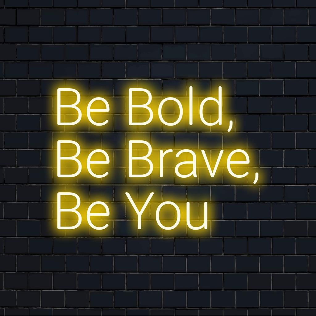 Anpassad neon LED-skylt som visar Be Bold, Be Brave, Be You i livfulla färger, perfekt för motiverande och personlig inredning.