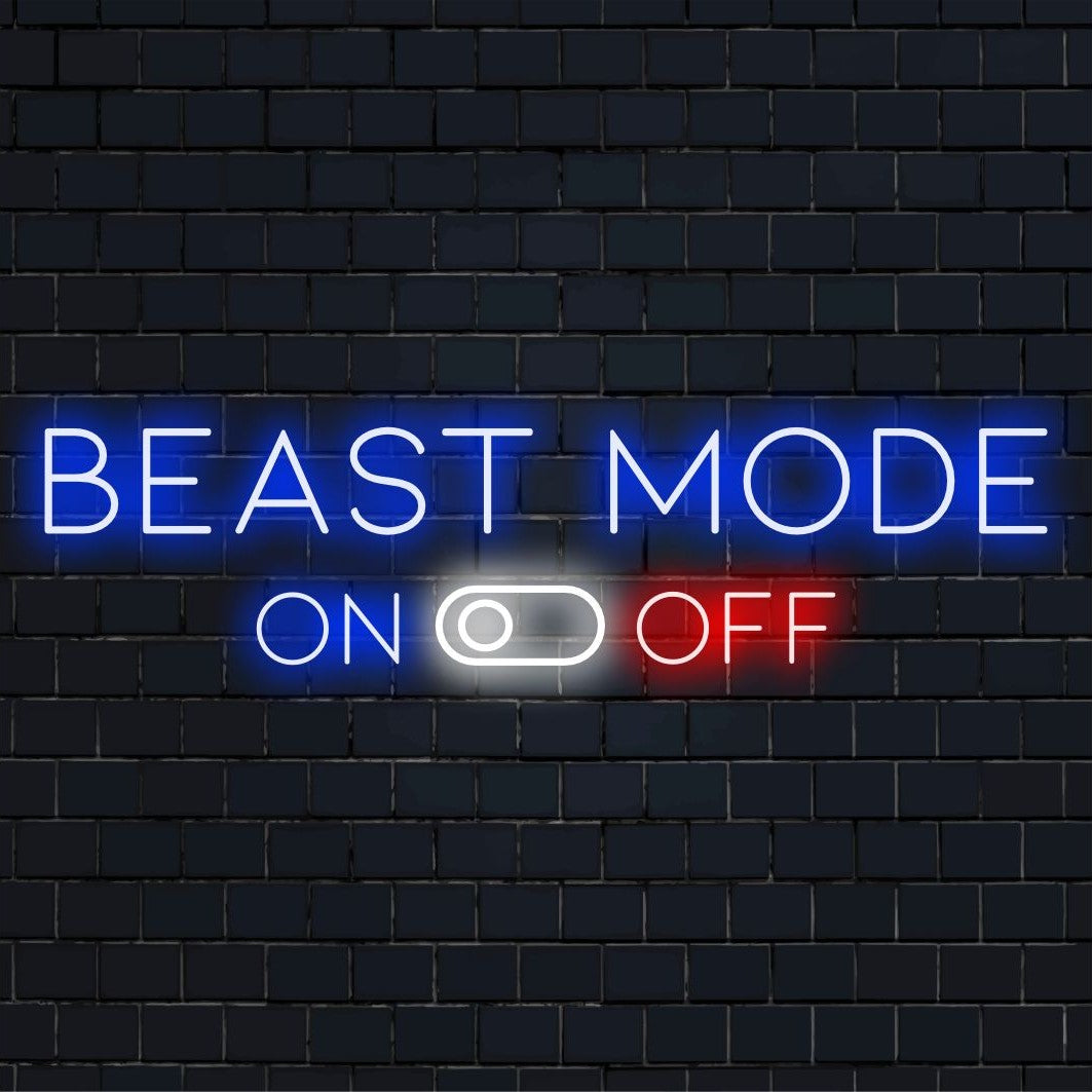Neonväggkonst med Beast Mode PÅ i livfulla LED-ljus, perfekt för dessa kraftfulla och motiverande dekorvibbar.