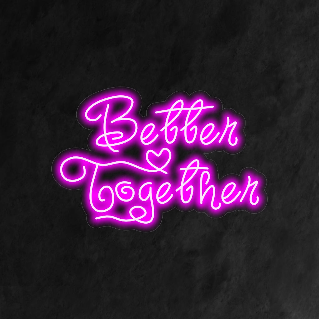 "Better Together Neon Sign" - Ett hjärtvärmande neonljus med ett budskap om enhet och samhörighet, som ingjuter en atmosfär av anslutning och delad glädje i ditt vardagsrum.