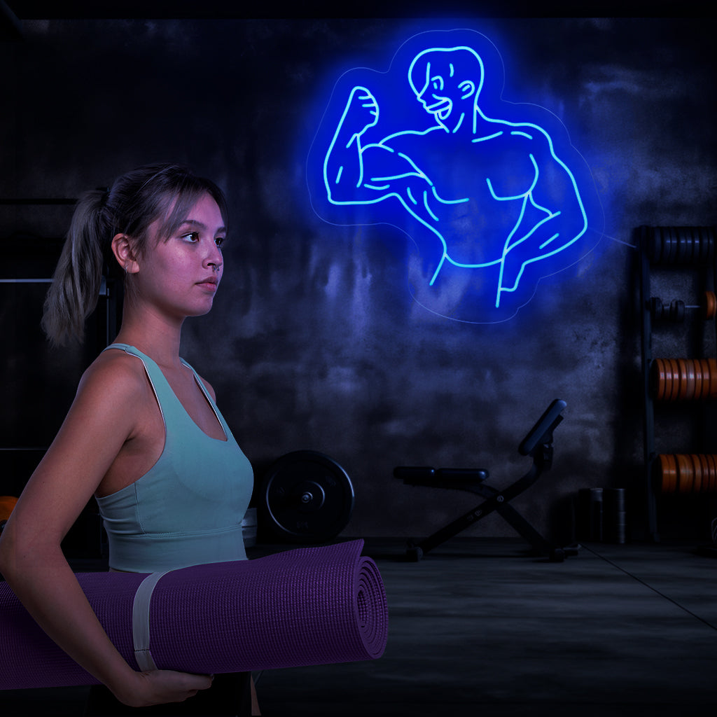 "Bodybuilder Neon Sign" - Ett kraftfullt neonljus med silhuetten av en muskulös kroppsbyggare, som ingjuter styrka och beslutsamhet i ditt gym eller gym.