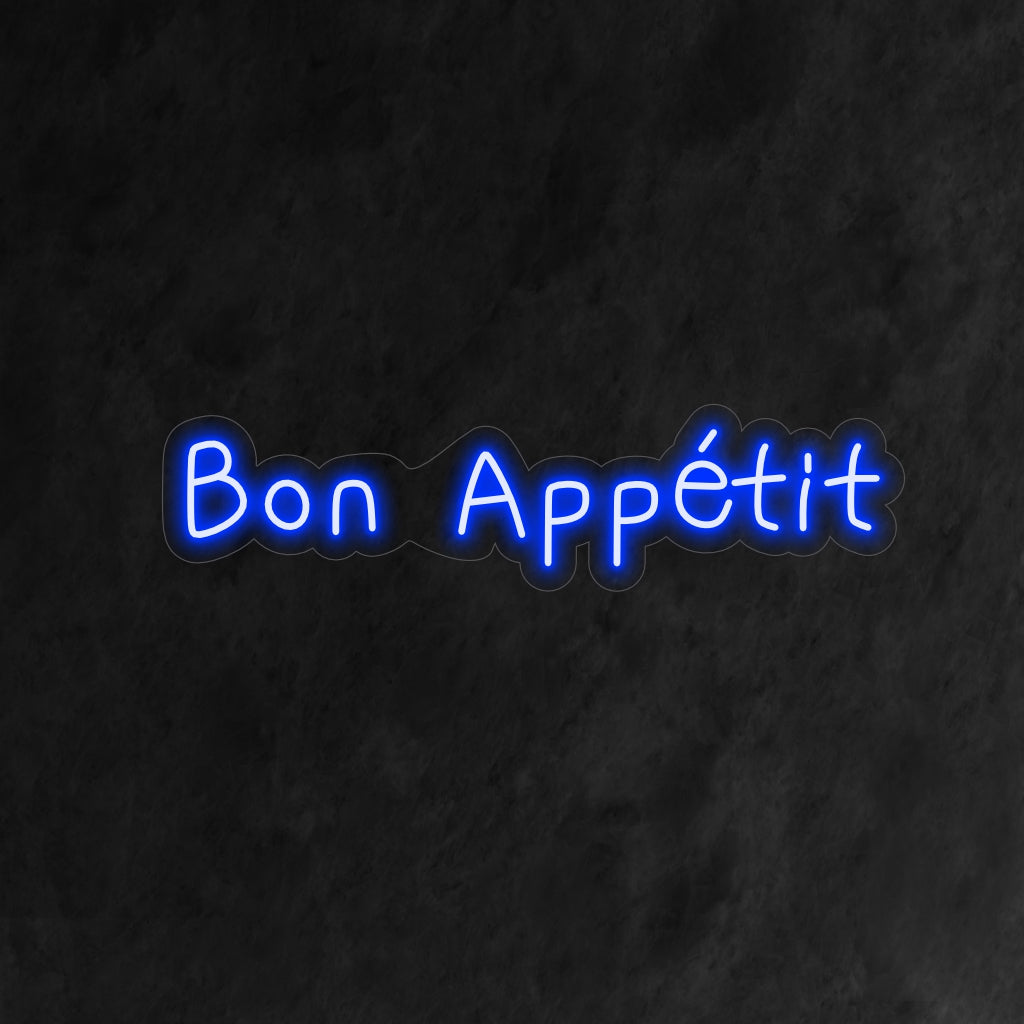 "Bon App��tit Neon Sign" - Ett charmigt neonljus med orden "Bon App��tit", som ingjuter kulinarisk njutning och en välkomnande atmosfär i ditt kök eller matplats.
