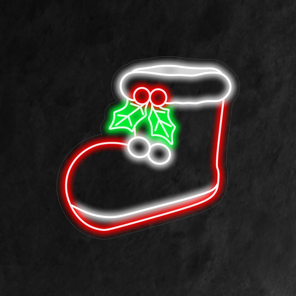 "Christmas Boot Neon Sign" är ett festligt och säsongsbetonat tillskott till din inredning. Ett neonljus som ger julstämning med en charmig julkänga.