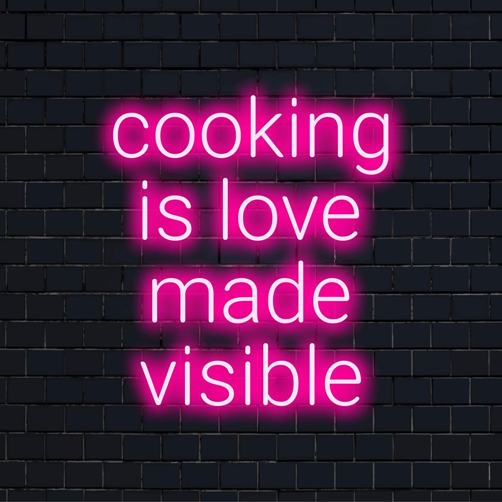 Anpassad LED neonskylt med frasen Cooking Is Love Made Visible i elegant manus; perfekt kök neon inredning.