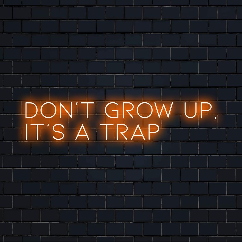 Skräddarsydd LED-neonskylt som läser Don't Grow Up It's A Trap���ett iögonfallande neonmeddelande för alla utrymmen.