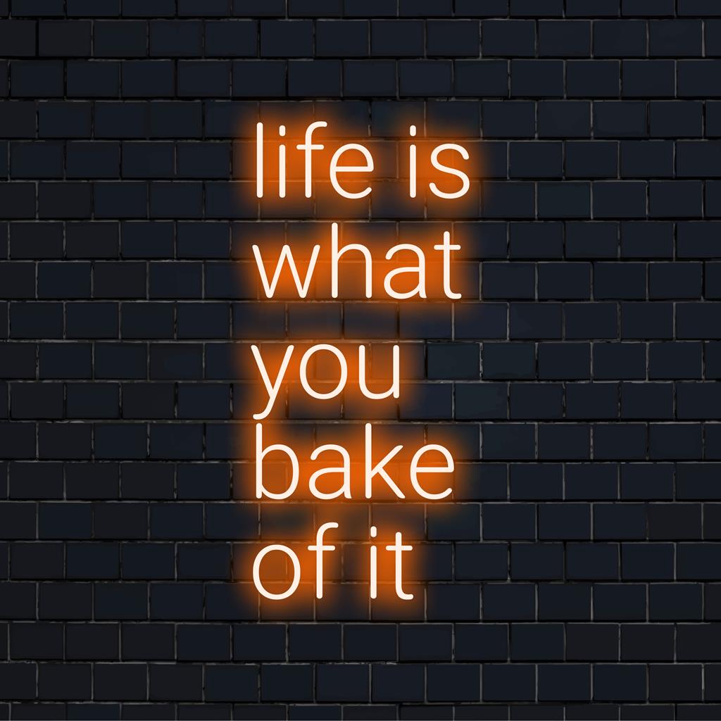 LED neonskylt med frasen Life Is What You Bake Of It i ljusa, färgglada ljus, perfekt för personlig inredning.