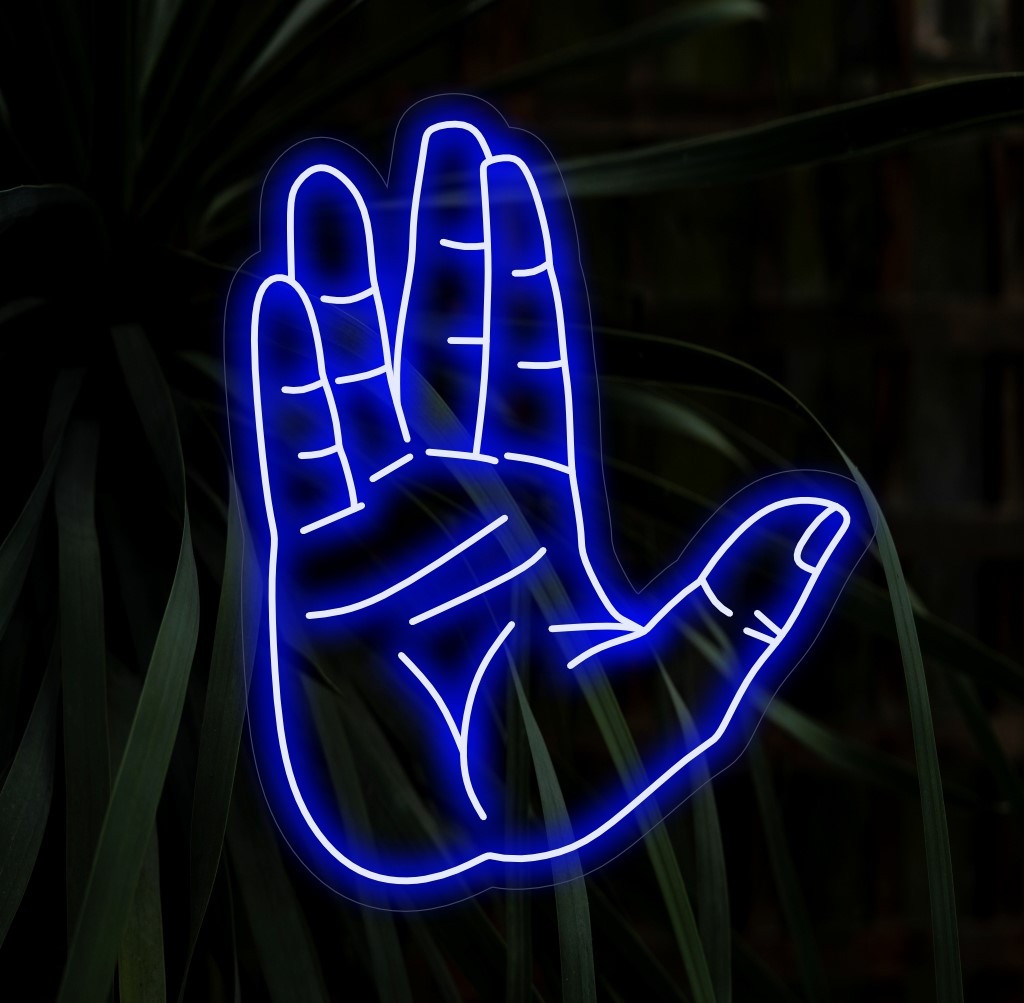 "Live Long And Successful Vulcan Salute Neon Sign" är ett kosmiskt och ambitiöst tillägg för utrymmen som söker en touch av sci-fi-visdom. Lys upp med intergalaktiska vibbar!