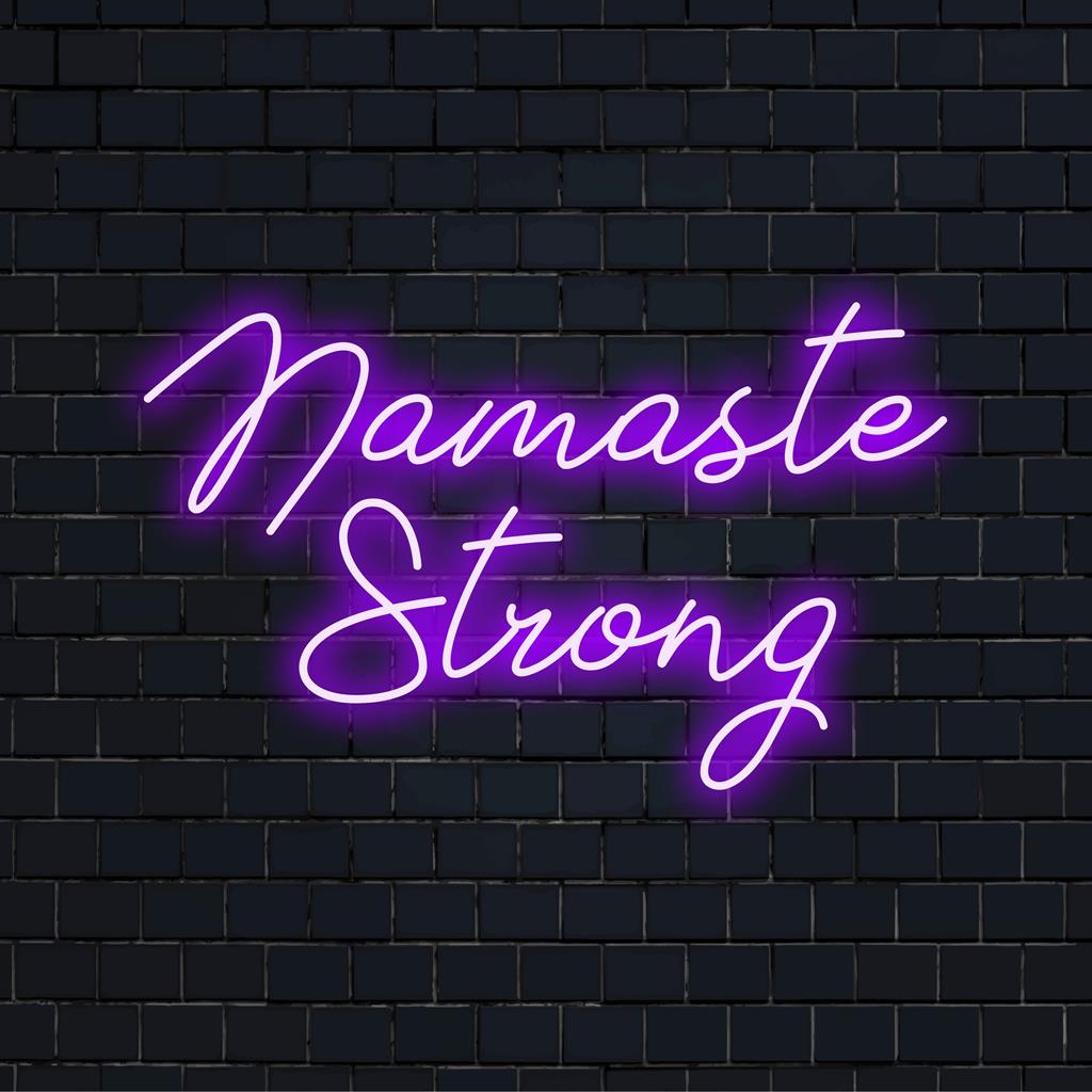 LED neonskylt som läser Namaste Strong; perfekt för inspirerande och dekorativ accentbelysning i anpassad LED-design.