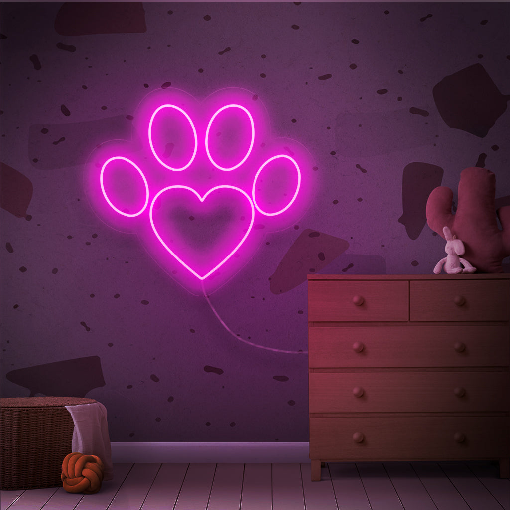 "Paw Neon Sign" är ett charmigt och hjärtevärmande tillägg, perfekt för utrymmen som hyllar kärleken till husdjur. Lys upp med värmen från ett tassavtryck!