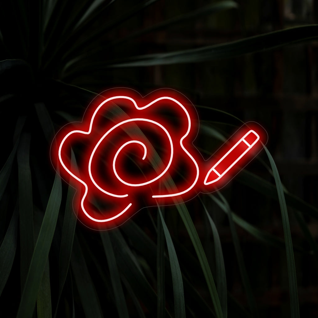 "Pencil while Drawing Flower Neon Sign" är ett kreativt och konstnärligt tillägg, perfekt för utrymmen som uppskattar skönheten i den konstnärliga processen. Lys upp med essensen av kreativitet och blommor!