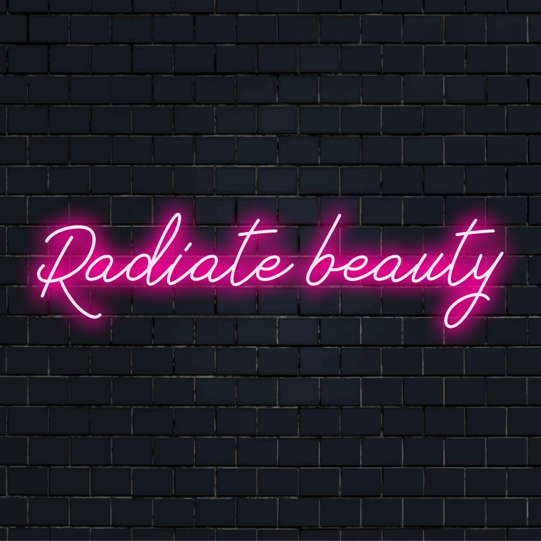 Skräddarsydd LED-neonskylt från märket Art Neon med frasen Radiate Beauty i livfulla neonfärger.