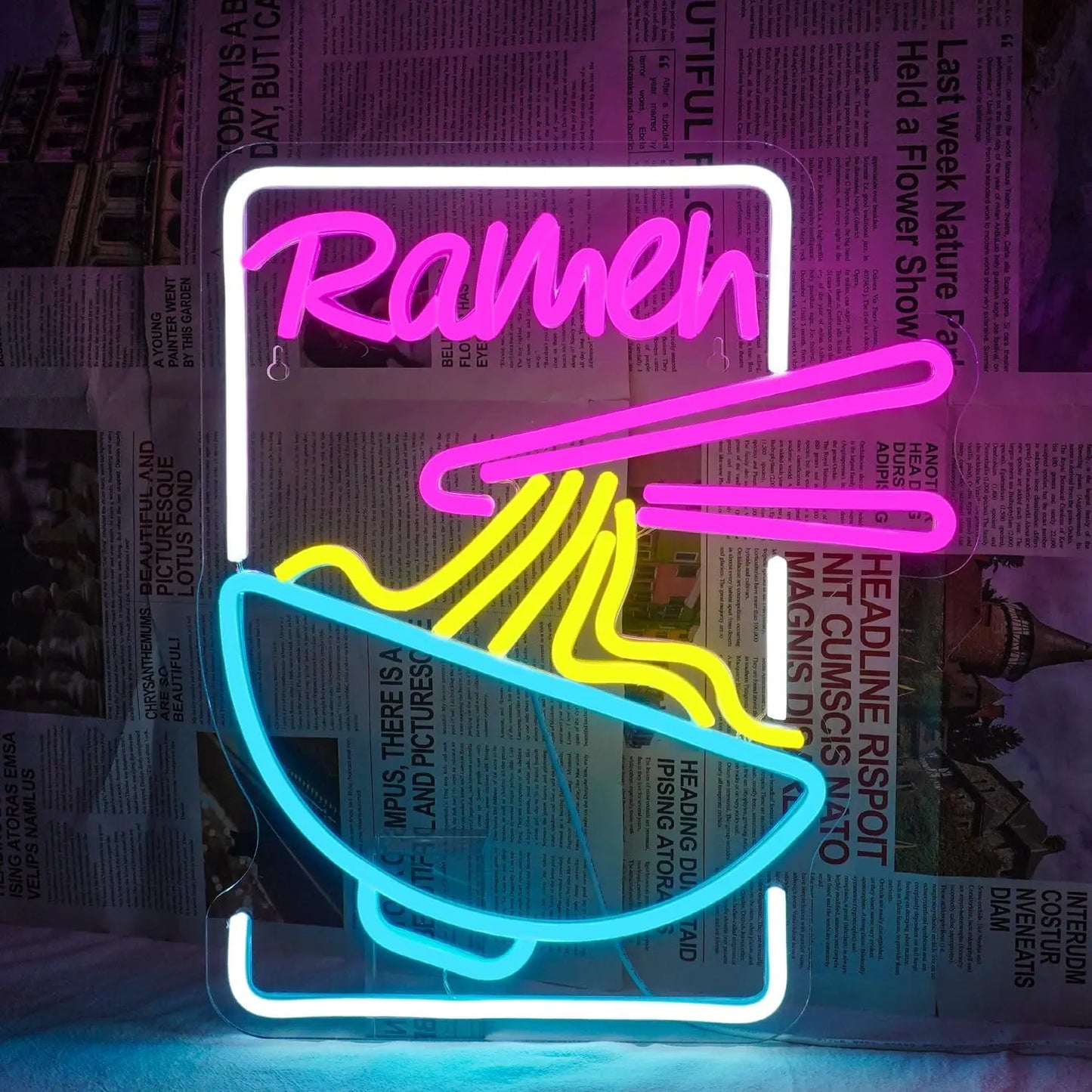 Bilden har en levande LED-neonskylt som visar orden "Ramen Time" i ett iögonfallande manus.
