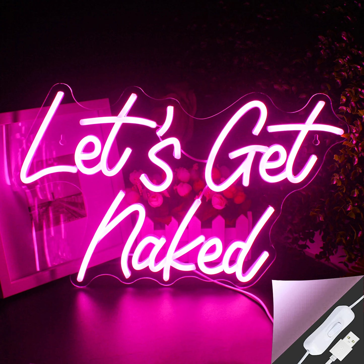 Bilden har en levande LED-neonskylt som visar frasen "Let's Get Naked" i ett stilfullt skripttypsnitt.