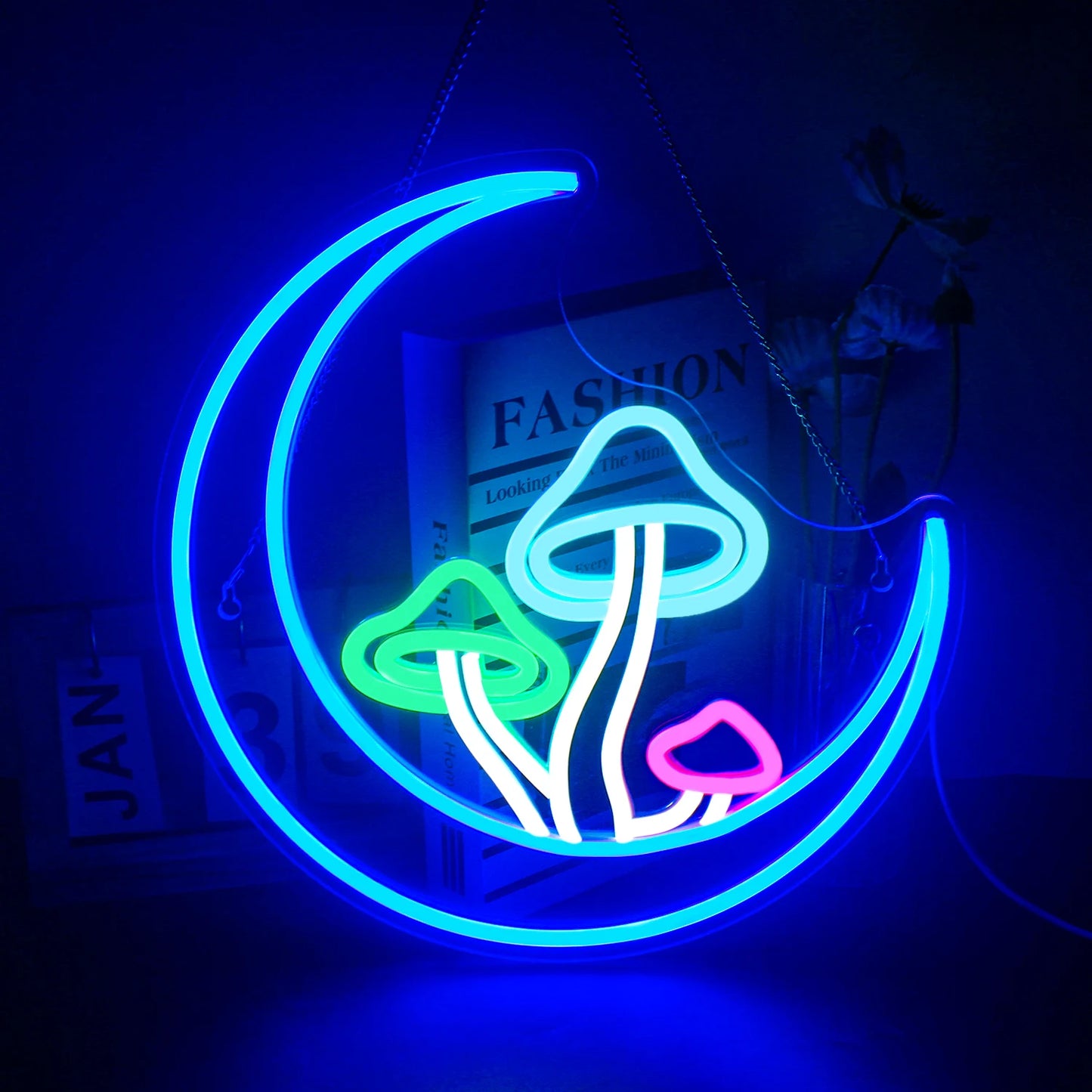 "Bilden visar en levande och inbjudande LED-neonskylt formad som en nyckfull måne med en svampdesign.