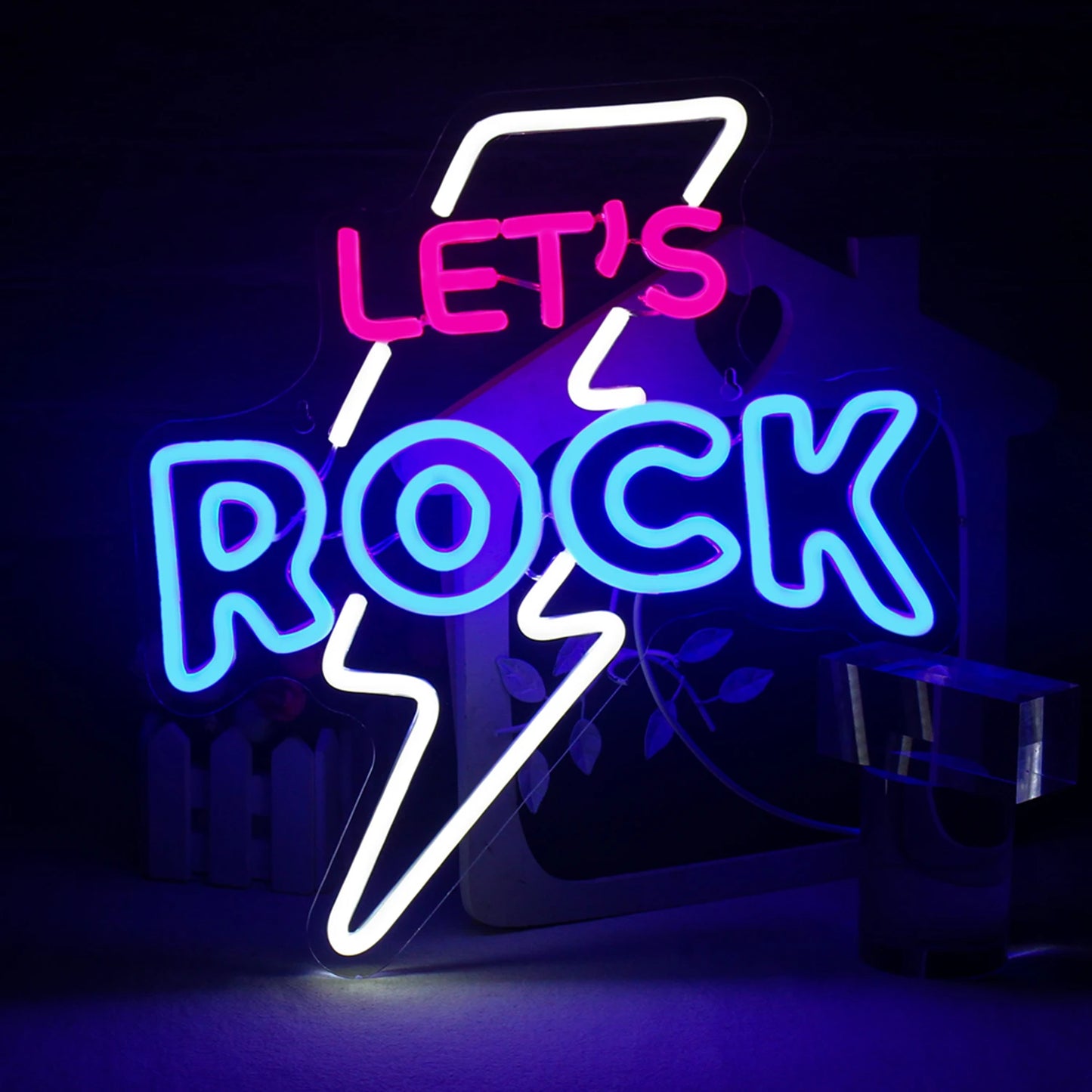 En levande LED-neonskylt som visar orden "Let's Rock" i en iögonfallande design.