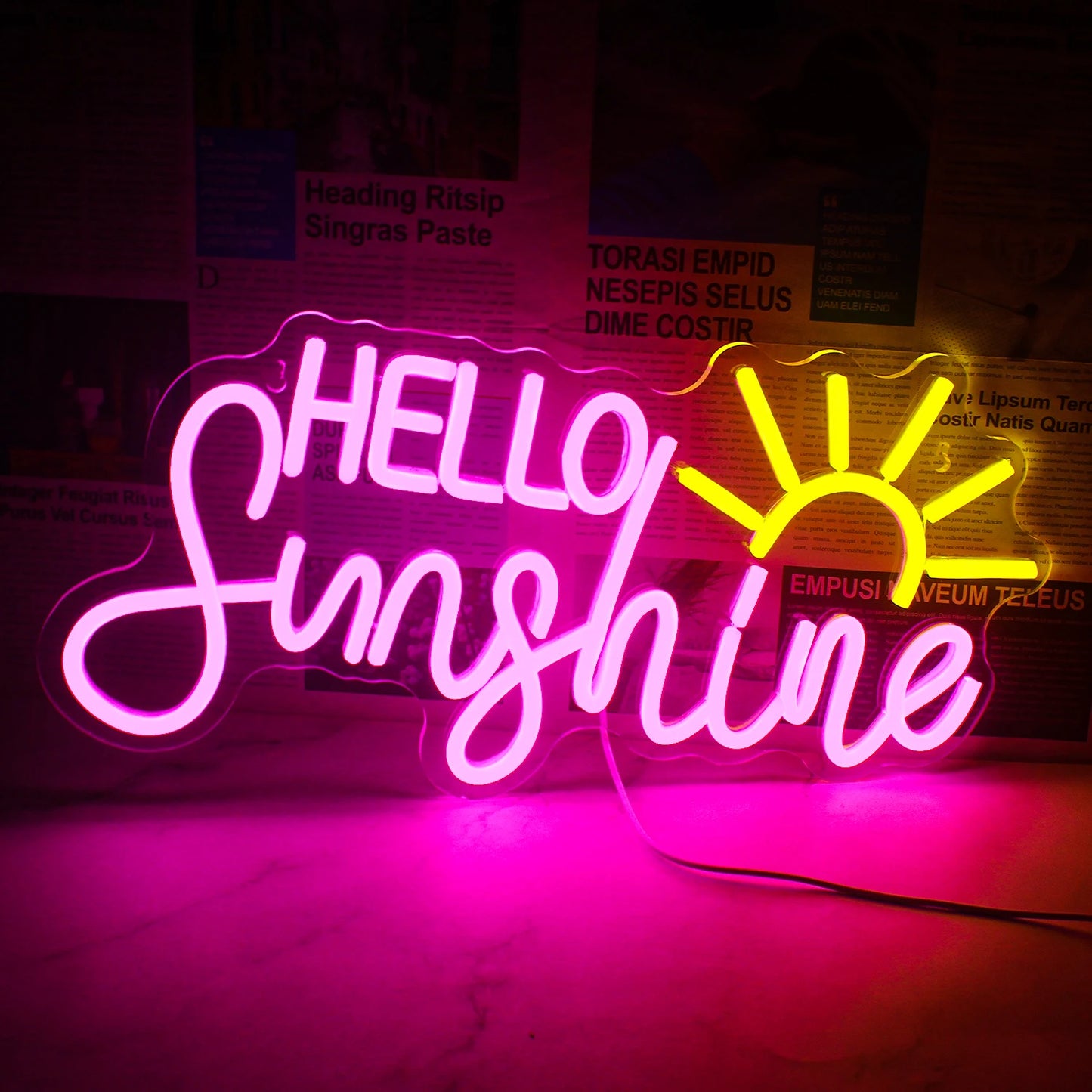 Bilden har en levande, handgjord LED-neonskylt som visar texten "Hello Sunshine.