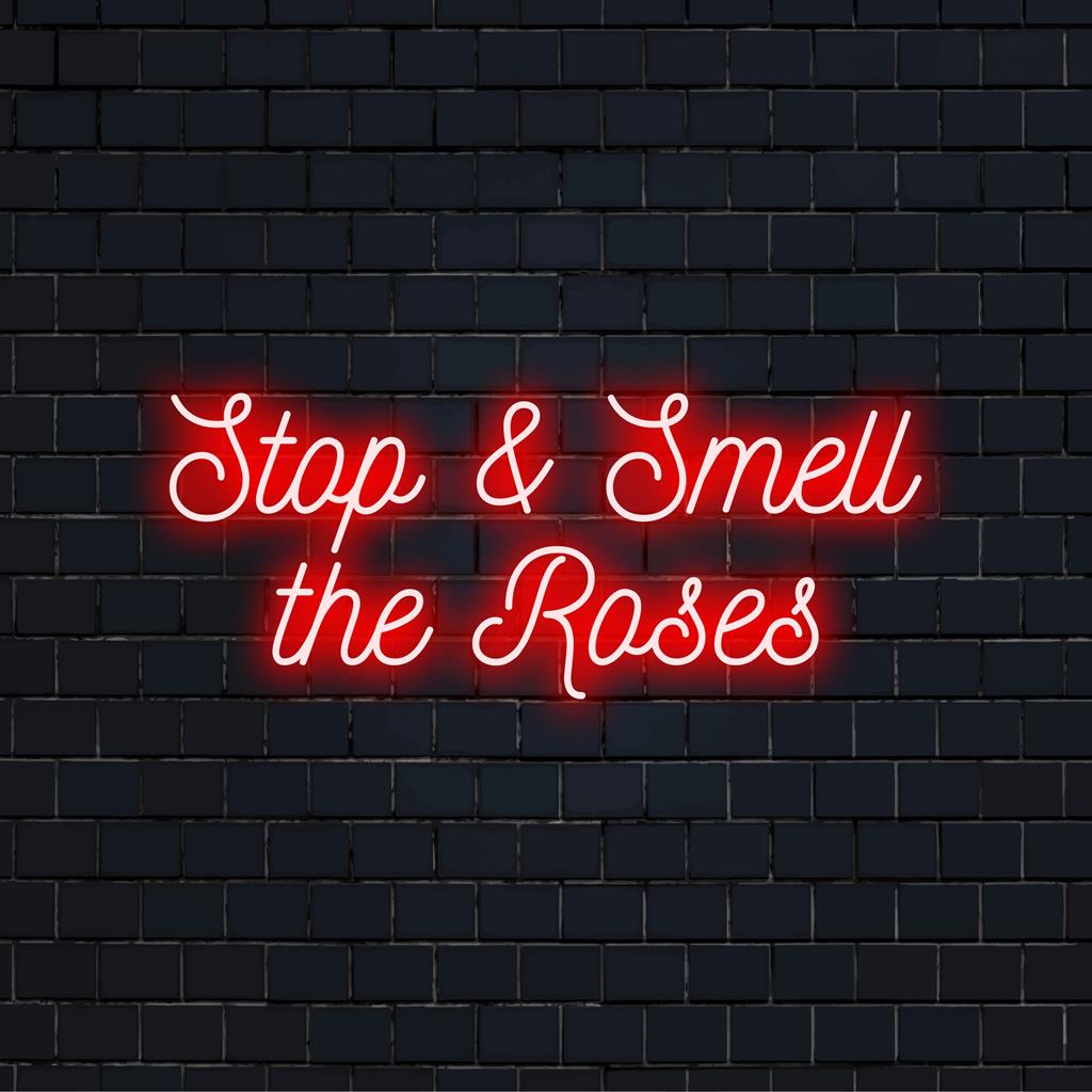 Anpassad LED neonskylt med Stop And Smell The Roses-frasen; perfekt neonljusdekor för alla utrymmen.