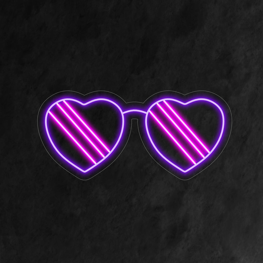 "Heart-Shaped Sunglasses Neon Sign" blandar romantik och stil med sin chica design och ger en unik glöd som höjer atmosfären i ditt utrymme.