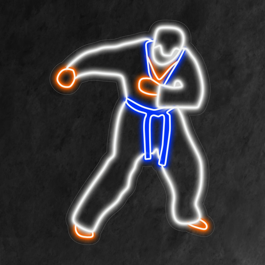 "Taekwondo Neon Sign" förkroppsligar kampsportens dynamik med sin kraftfulla glöd, som hyllar disciplin och styrka.