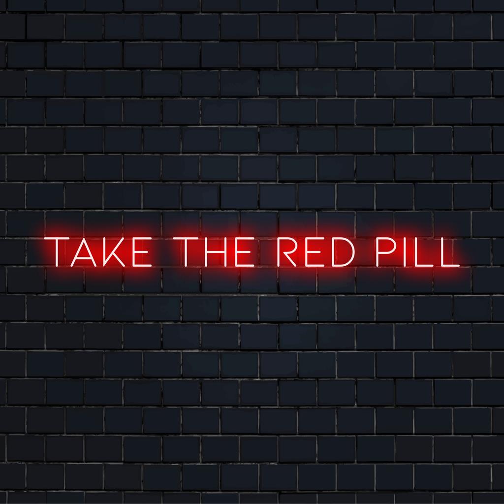 LED-neonskylt som visar frasen Take The Red Pill i livfullt, iögonfallande ljus. Perfekt för modern väggdekoration.