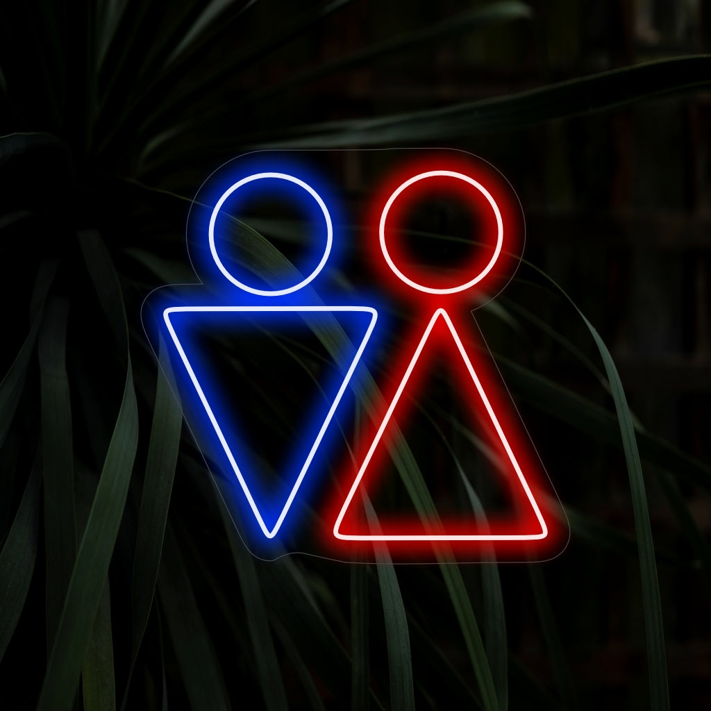 "Toalett man och kvinna triangel neonskylt" har ljusa, universella symboler för enkel identifiering av toaletten.
