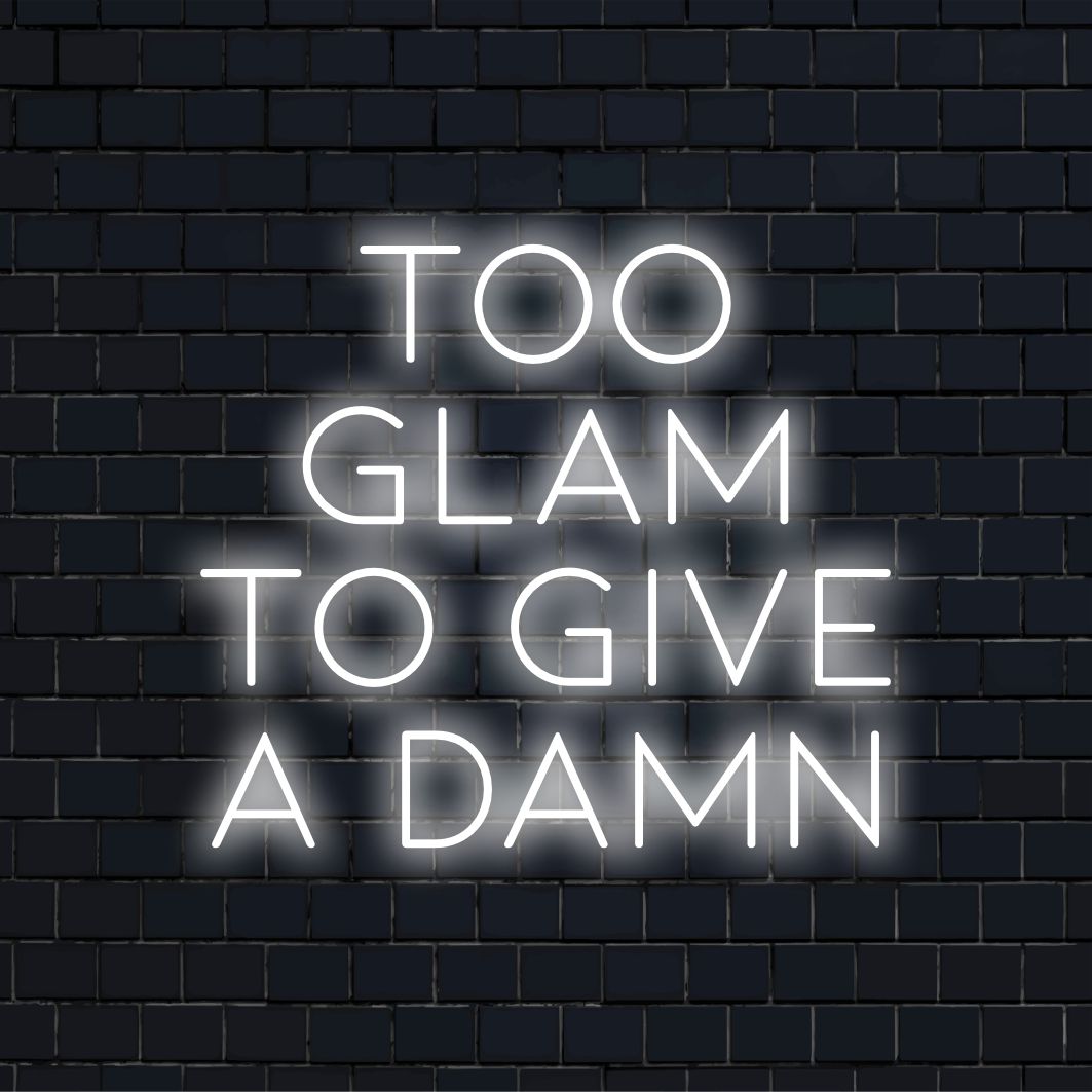 Anpassad LED-neonskylt med texten Too Glam To Give A Damn, perfekt för elegant inredning med neonkonststil.