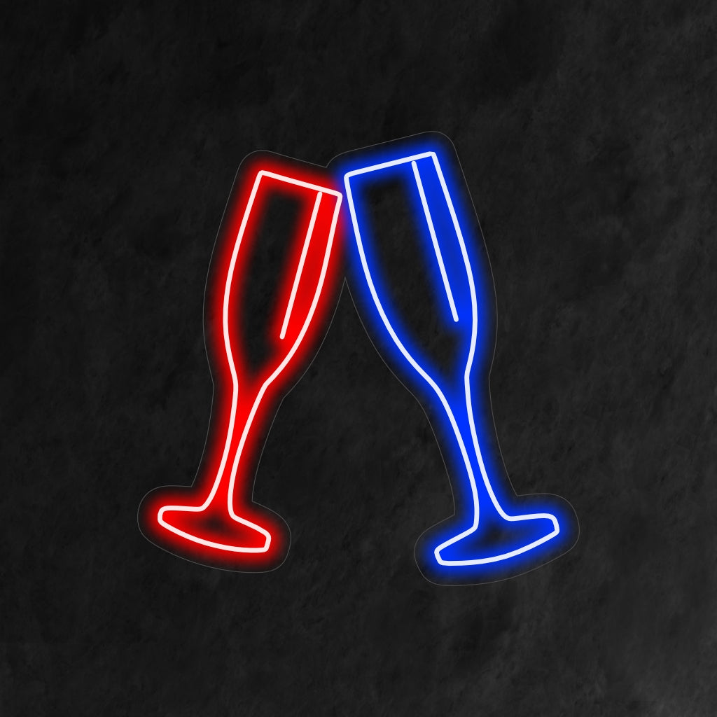 "Two Champagne Glasses Neon Sign" är ett sofistikerat och celebert tillskott till din interiör. Ett neonljus som symboliserar elegans och skålar för speciella tillfällen.