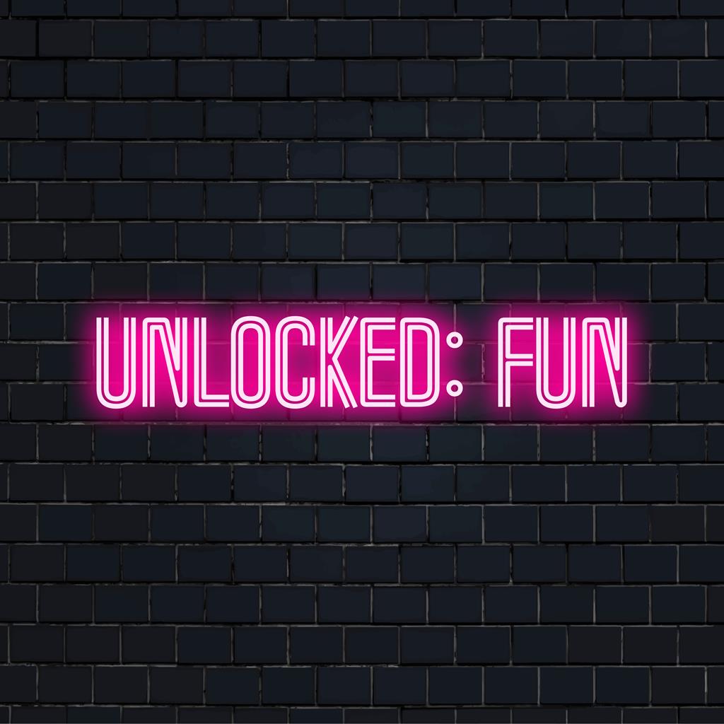 Färgglada LED-neonskyltar som läser Unlocked Fun, fångar levande energi, perfekt för unik väggkonst och ljus heminredning.