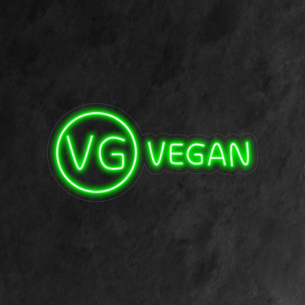 "Vegan Neon Sign" utstrålar ett levande sken och hyllar växtbaserat boende och hållbarhet i ditt utrymme.