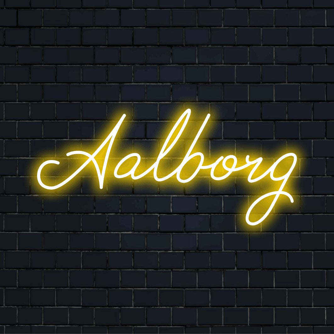 Aalborg Neon Light with glowing wall decor against brick backdrop