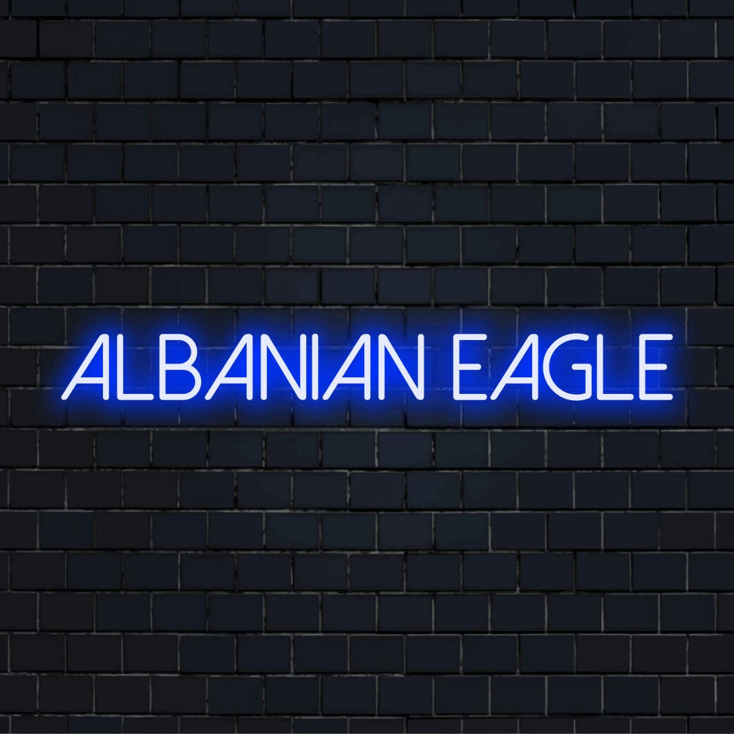 Albanian Eagle Neon Sign, bright neon lettering against brick backdrop