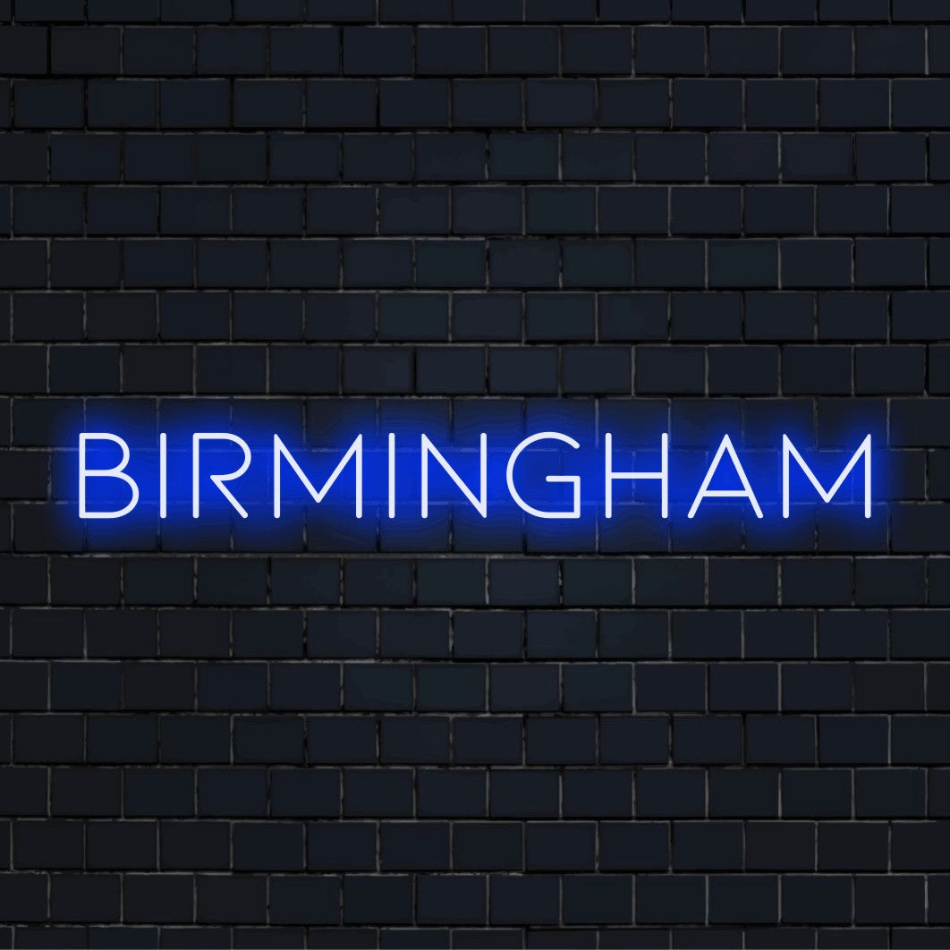 Birmingham LED Neon Sign, soft neon glow against black brick wall
