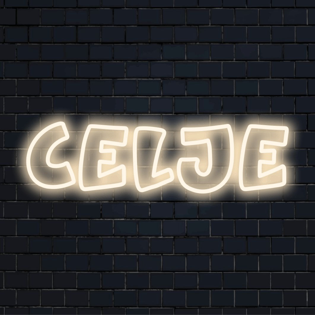 Celje Neon Light with bright LED glow against brick backdrop