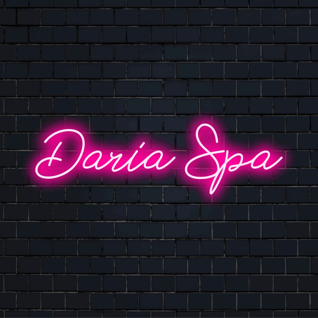 Daria Spa Personalized LED Neon Sign, soft neon glow against brick backdrop