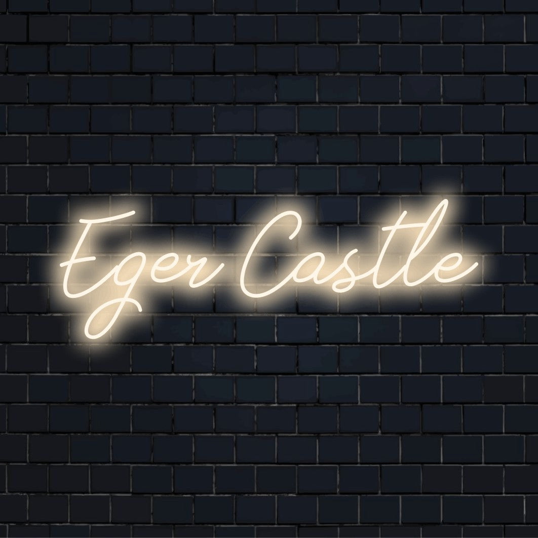 Eger Castle Neon Sign, glowing wall decor against black brick wall
