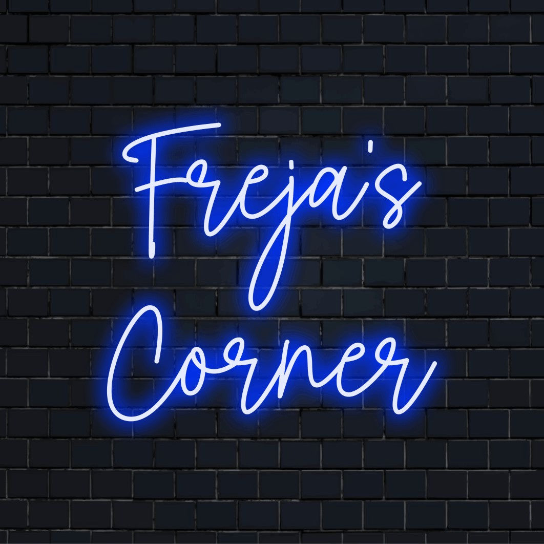 Freja_s Corner Personalized LED Neon Sign, bright neon glow on black brick background