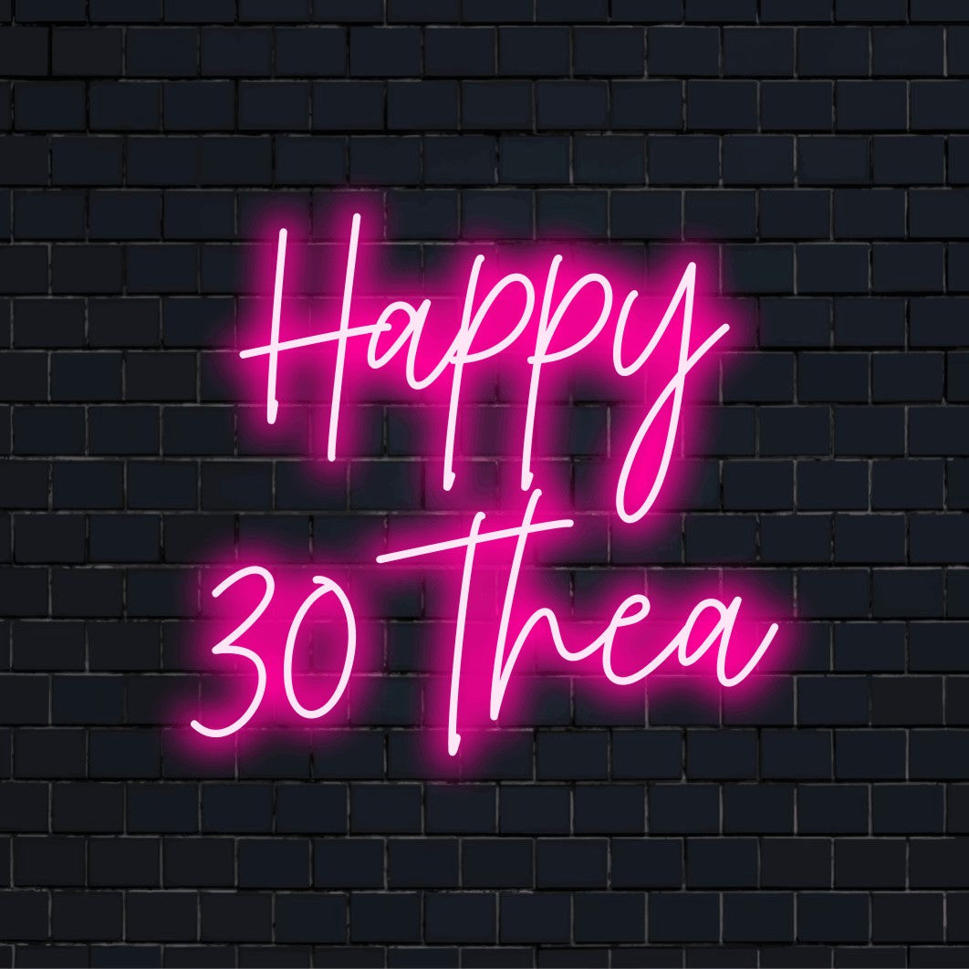 Happy 30 Thea Custom Name Neon Sign, bright LED glow on dark brick wall