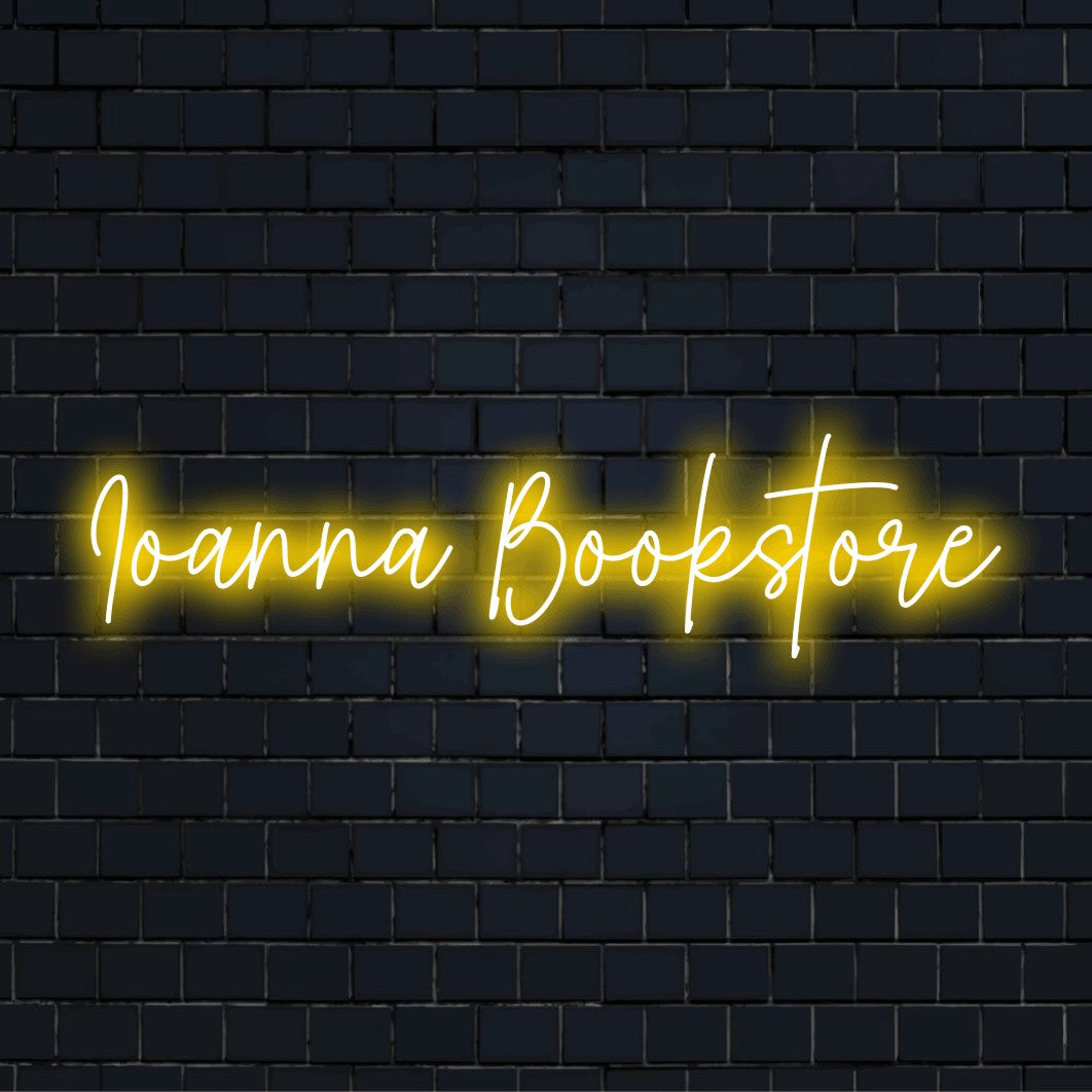 Ioanna Bookstore Personalized Neon Light with bright neon lettering against brick backdrop
