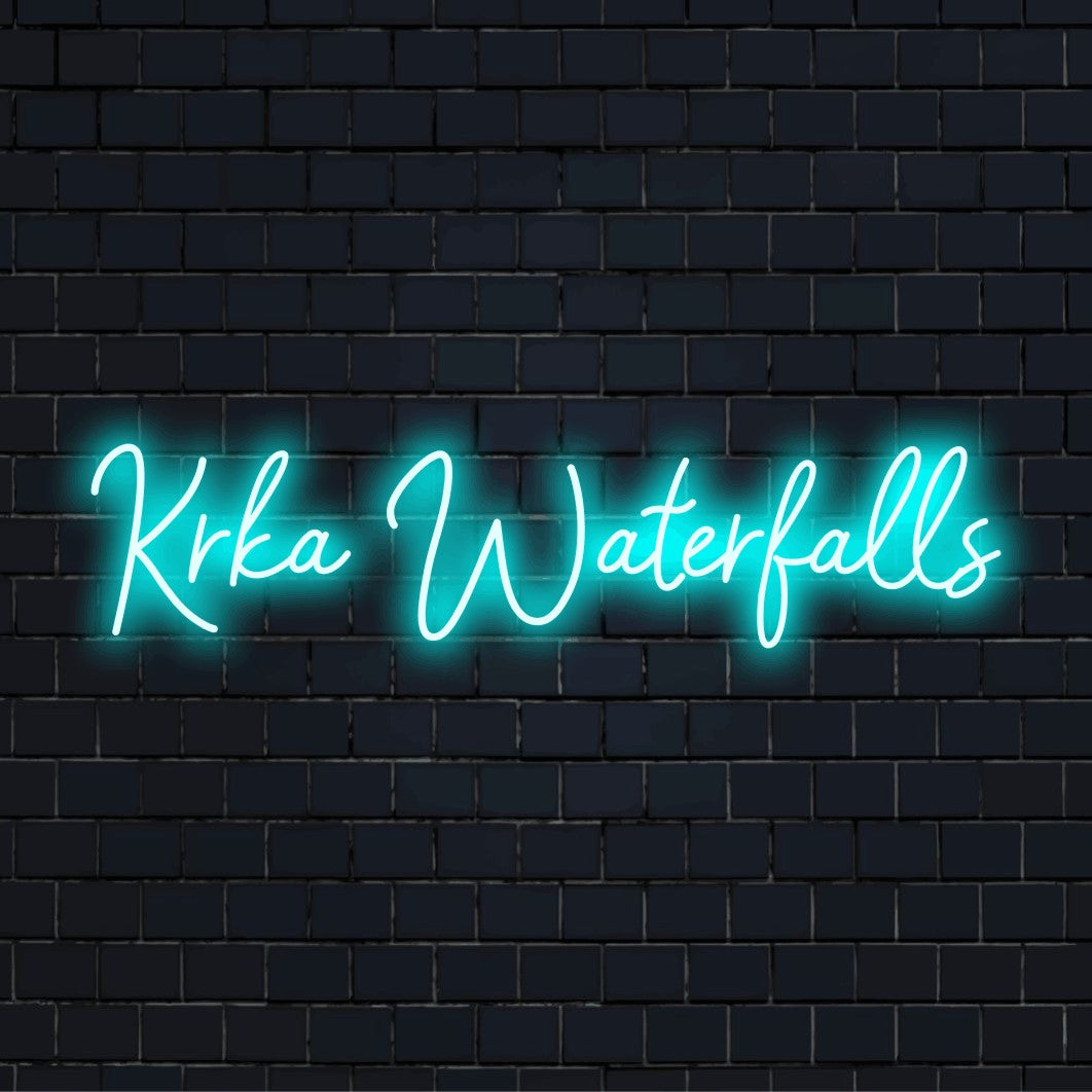 Krka Waterfalls LED Neon Sign, bright neon lettering against brick backdrop