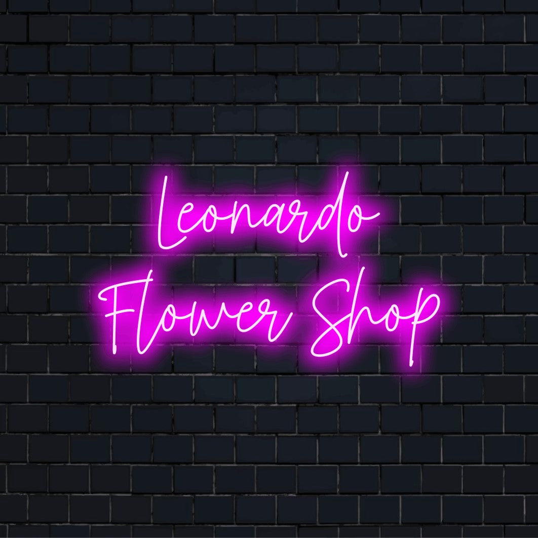 Leonardo Flower Shop Custom Name Neon Sign, glowing neon text on black brick background