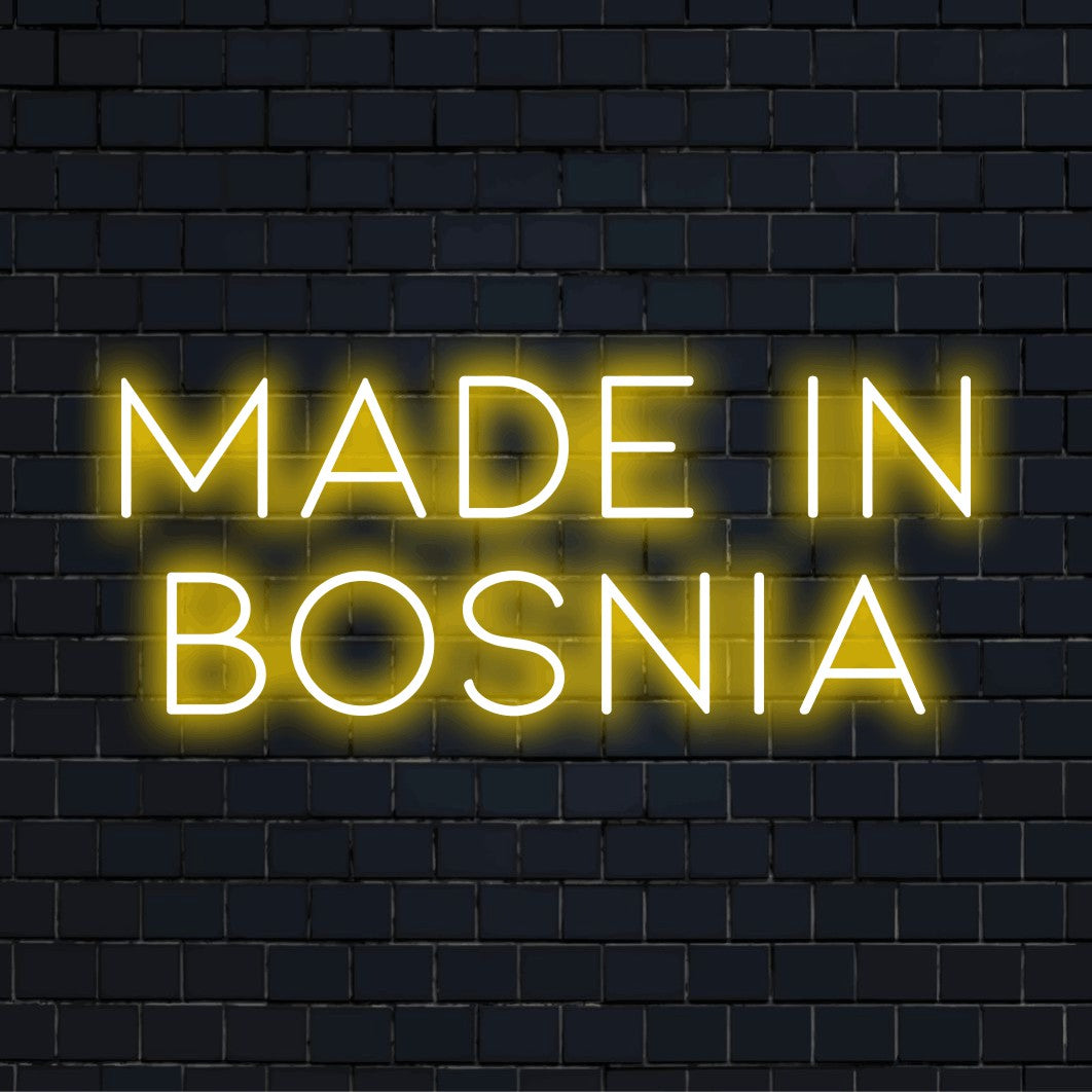 Made In Bosnia Neon Sign, soft neon glow against brick backdrop