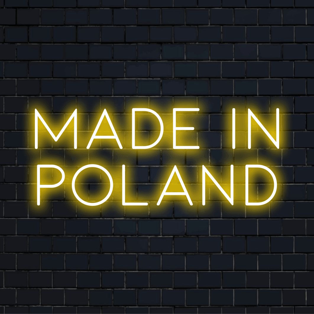 Made In Poland LED Neon Sign, bright neon glow against black brick wall