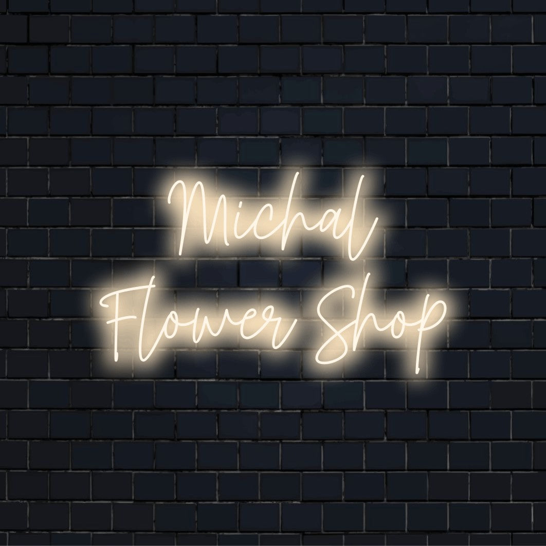 Michal Flower Shop Custom Name Neon Sign, bright neon lettering on dark brick background
