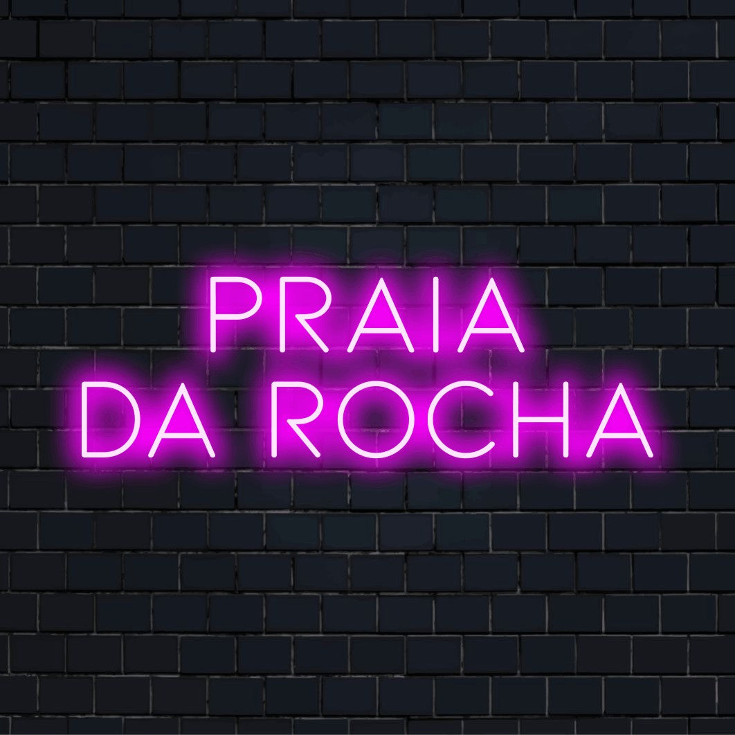 Praia Da Rocha Neon Sign, glowing wall decor against black brick wall