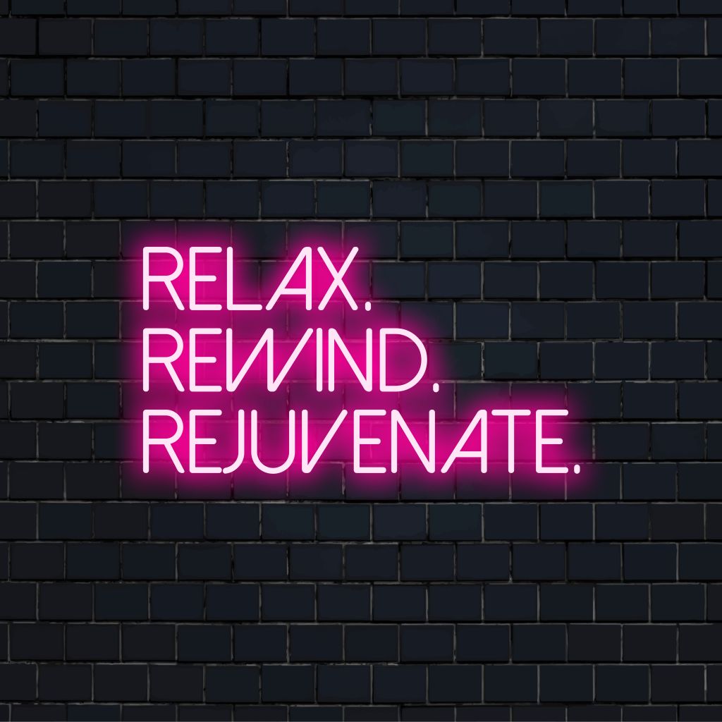 Relax Rewind Rejuvenate LED Neon Sign, bright LED glow on dark brick background