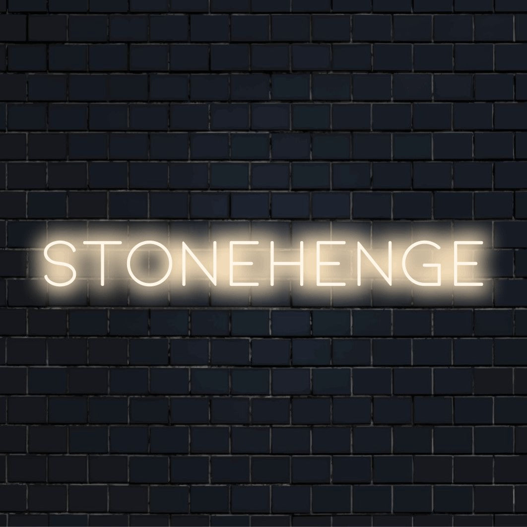 Stonehenge LED Neon Sign, glowing wall decor on dark brick background