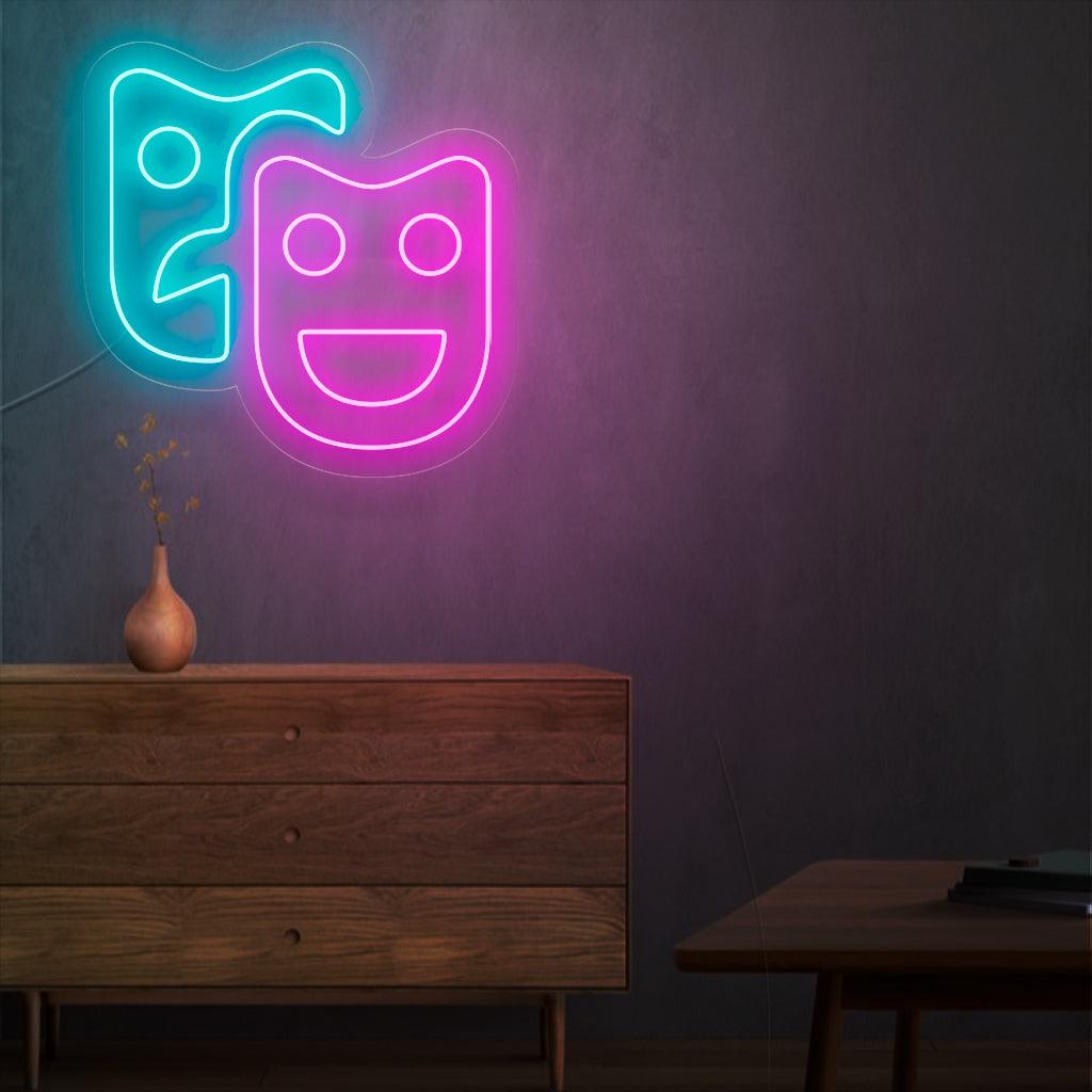 En fascinerande neonskylt med teatermasker som symboliserar drama och scenkonst. Denna skylt lägger till en touch av elegans och lockelse till alla nöjesställen