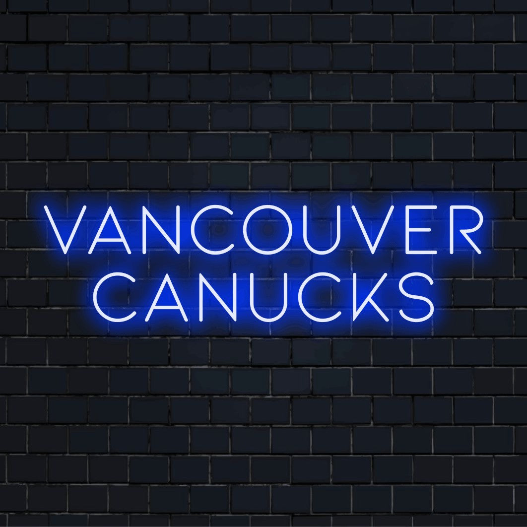 Vancouver Canucks Neon Sign, neon text light on black brick background