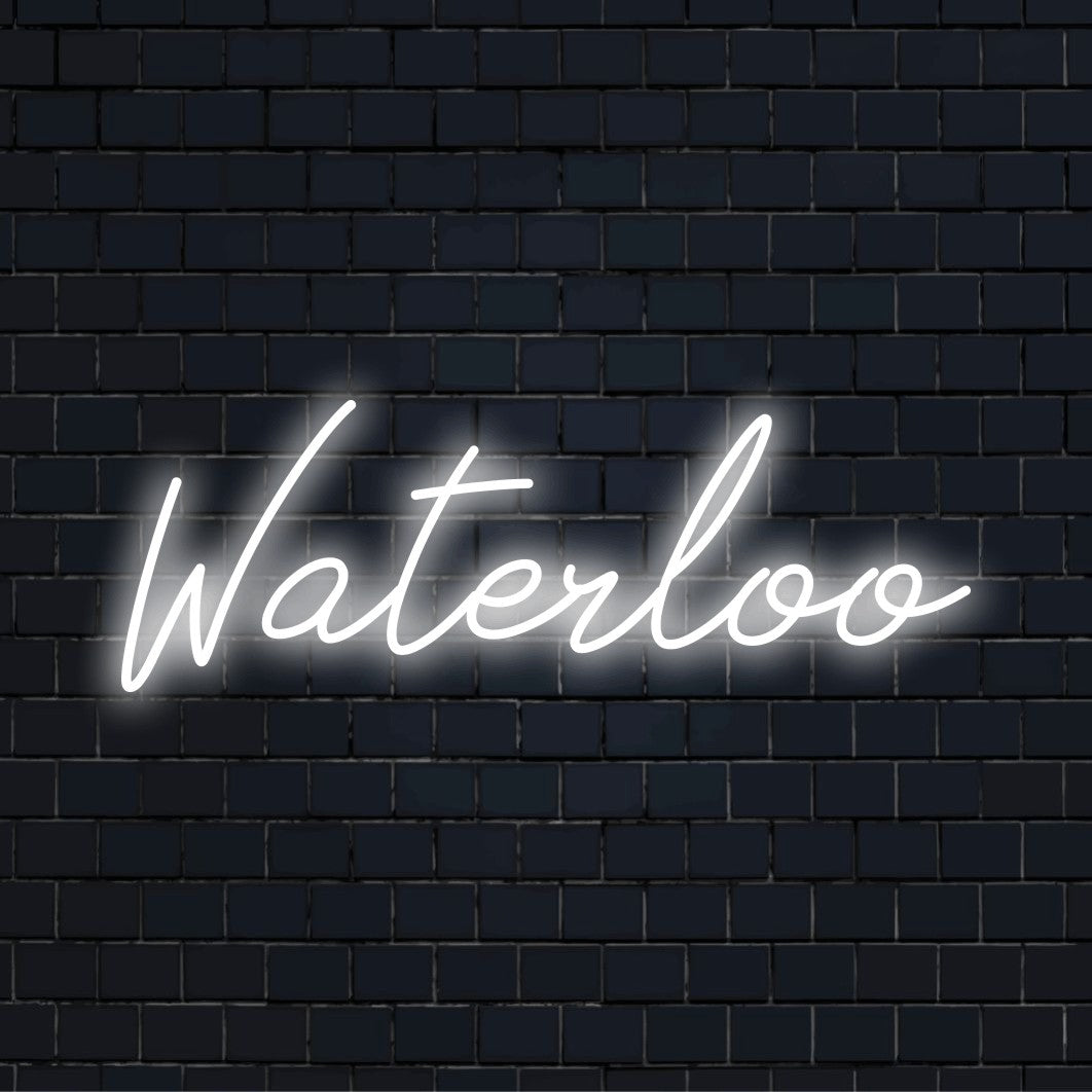 Waterloo Neon Sign, glowing neon text on dark brick background